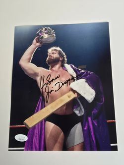 Jim “Hacksaw” Duggan Autograph Lot – 2 Items – JSA Certified (Signed 2x4 & 8x10 Photo)