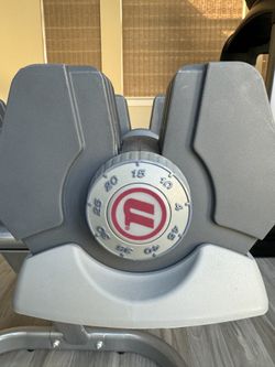 Universal powerpak adjustable dumbbells with stand hotsell
