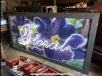 Large Neon “Floral “ sign