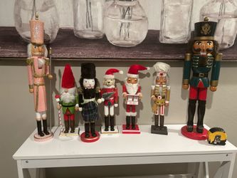 Nutcrackers 2 tall ones $15 rest $8 each