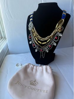 Juicy Couture layered floral/charm statement necklace with pouch