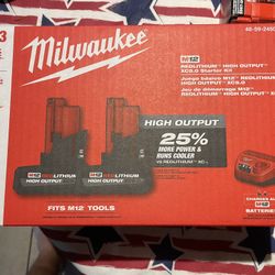 Milwaukee 12v (2) 5 ah high output batteries and 12v charger new $175 firm in n Lakeland 