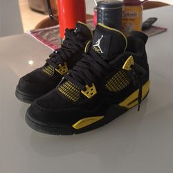 Yellow thunder jordan 4s