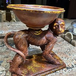 Monkey Holding Bowl