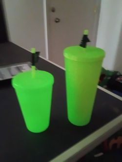 Glow in the dark green Starbucks coffee cup