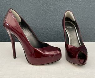 Stuart Weitzman pumps, size 7 and burgundy color