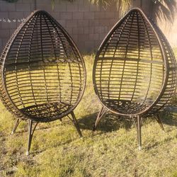 Two Egg Shaped Chairs With Cushions 
