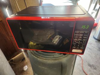 Small red microwave