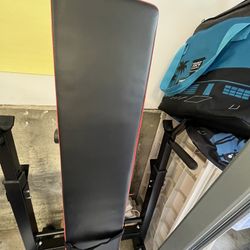 Weight Bench And Barbell