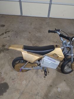 Razor mx350, custom gold, stunt pegs, cool stickers and underglow