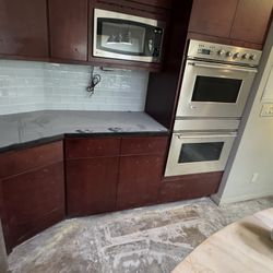 Entire kitchen and media center cabinets and drawers