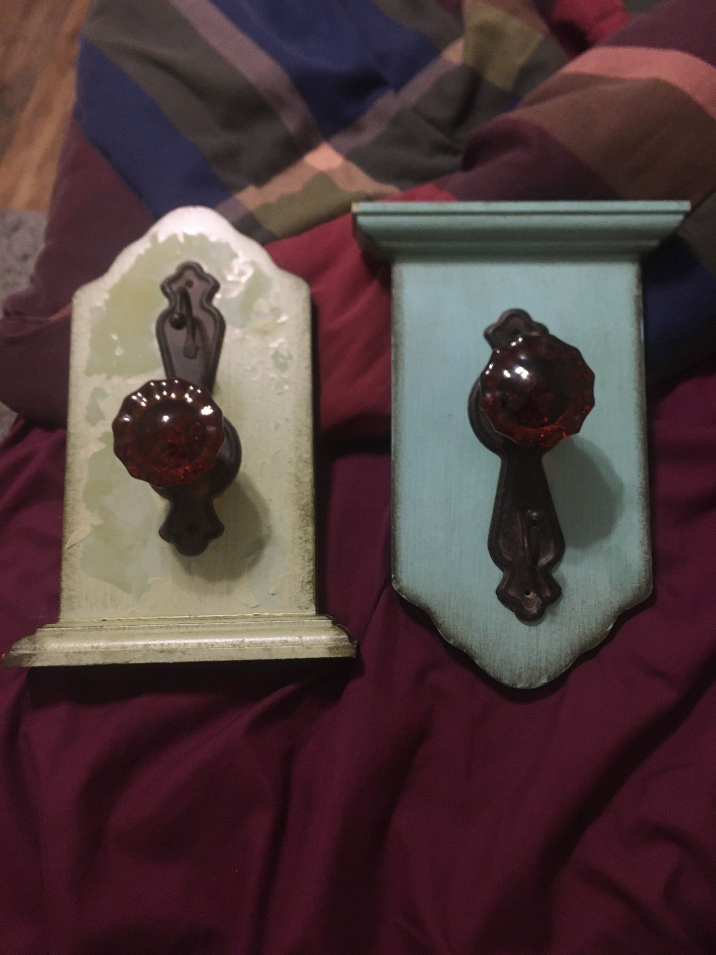 Book ends or hanging ornaments. Made of wood, doorknob and a hook. Antique look.