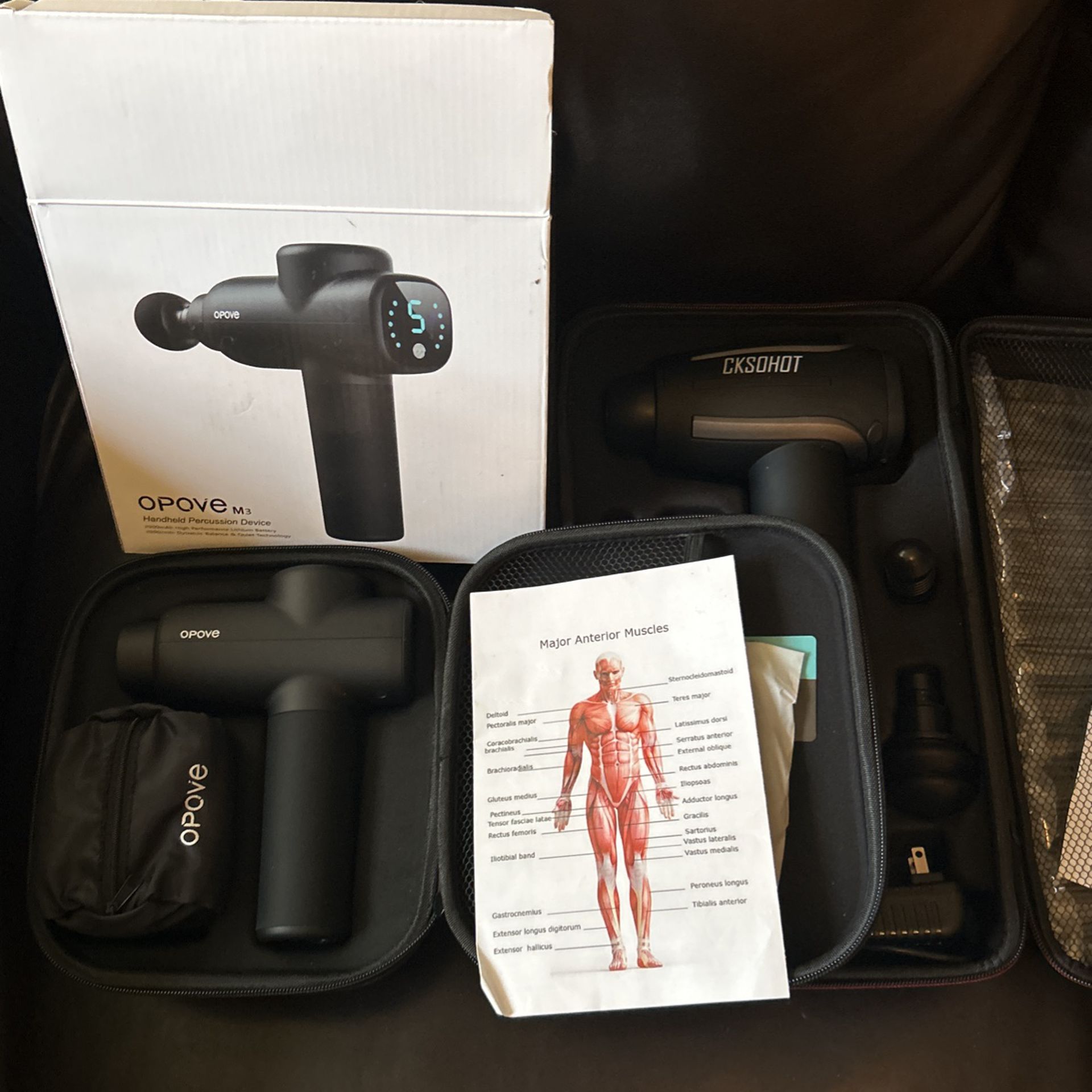 Two Percussion Massage Guns Handheld Both Include Cases And Attachments Rechargeable 