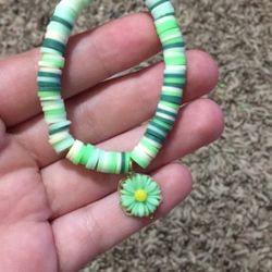 Cute Green Clay Bead Bracelet With A Green Flower Charm 