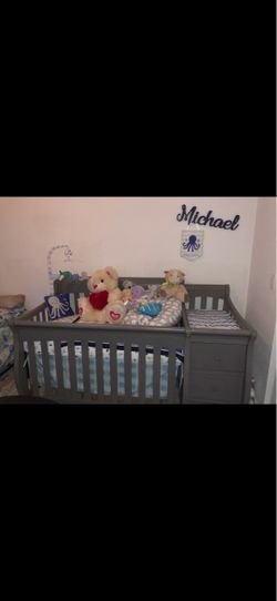 Gray Baby Crib with Attached Changing Table