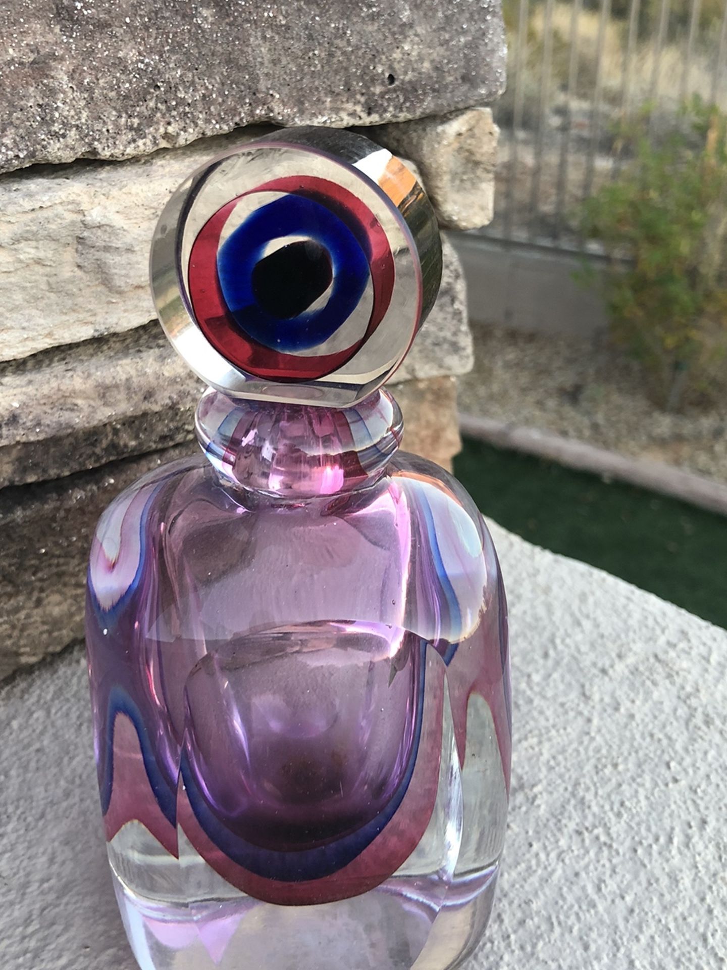 Pink and purple perfume bottle