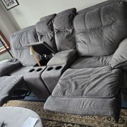 Reclining Sofa With Cup Holders And Storage.