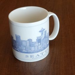 Seattle STARBUCKS Hometown Architecture Series Collectible 18oz Mug Rare 
@2012. Pre-owned, very good shape.
Mug is 4.5" tall, weight 1.2 oz plus ship