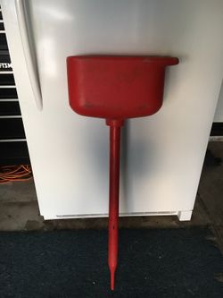 really long gas or oil funnel