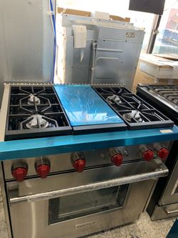 Wolf 36” slide in range in stainless steel with middle grill