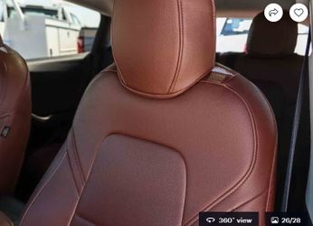 Tesla - brown faux leather seat covers and floors mats