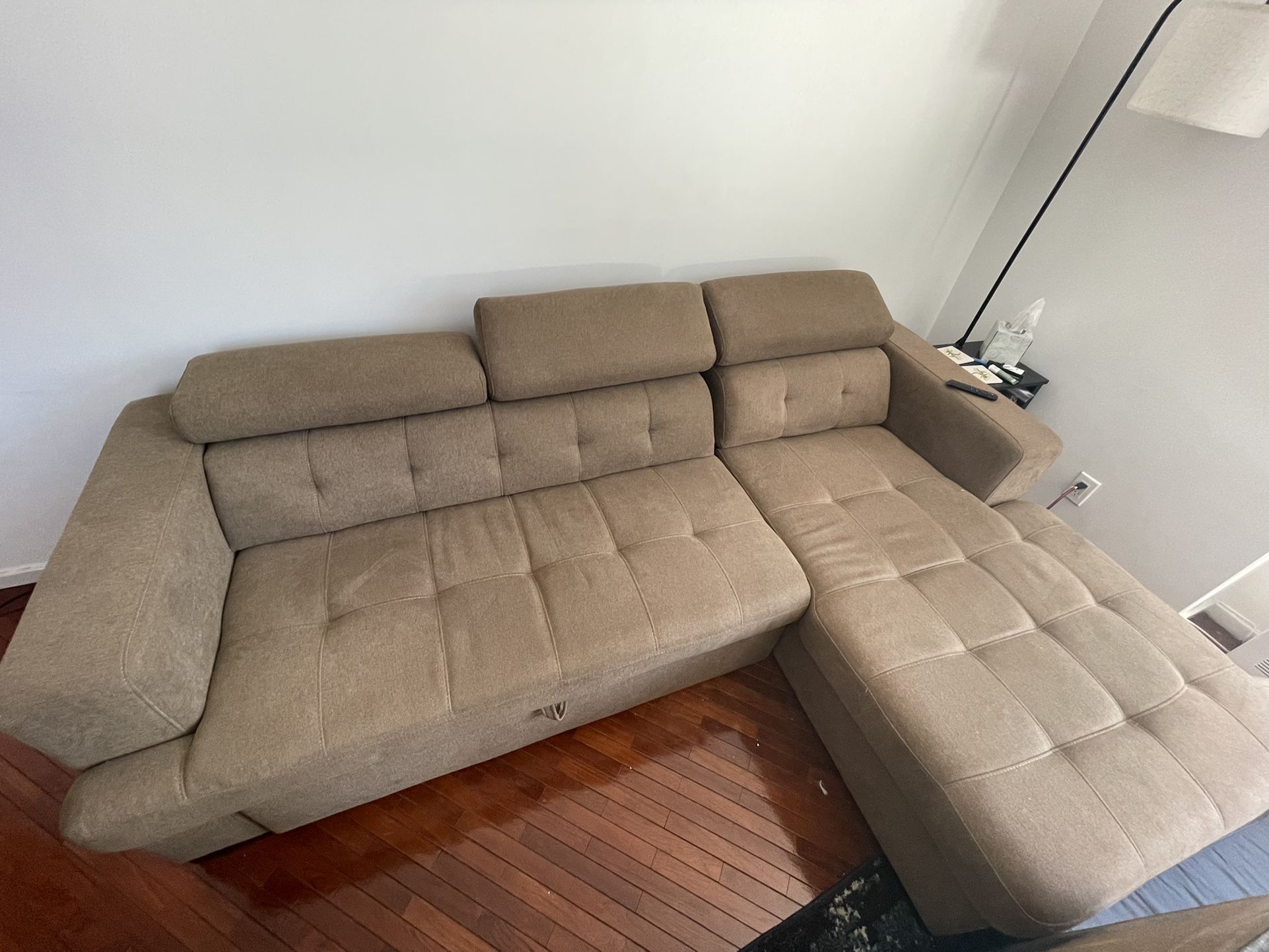 Bobs furniture -Tan Sectional With Chaise Storage And Pull Up Bed