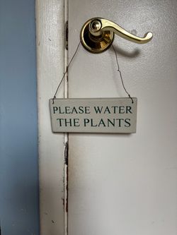 Door hanging wood sign