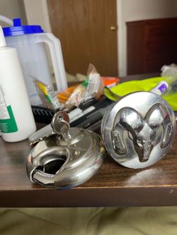 Brand new Uhaul storage lock and keys and dodge crysler abs center cap