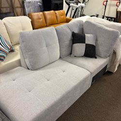 Gray small couch missing pieces 74’ lengths, width 32’ height 35’