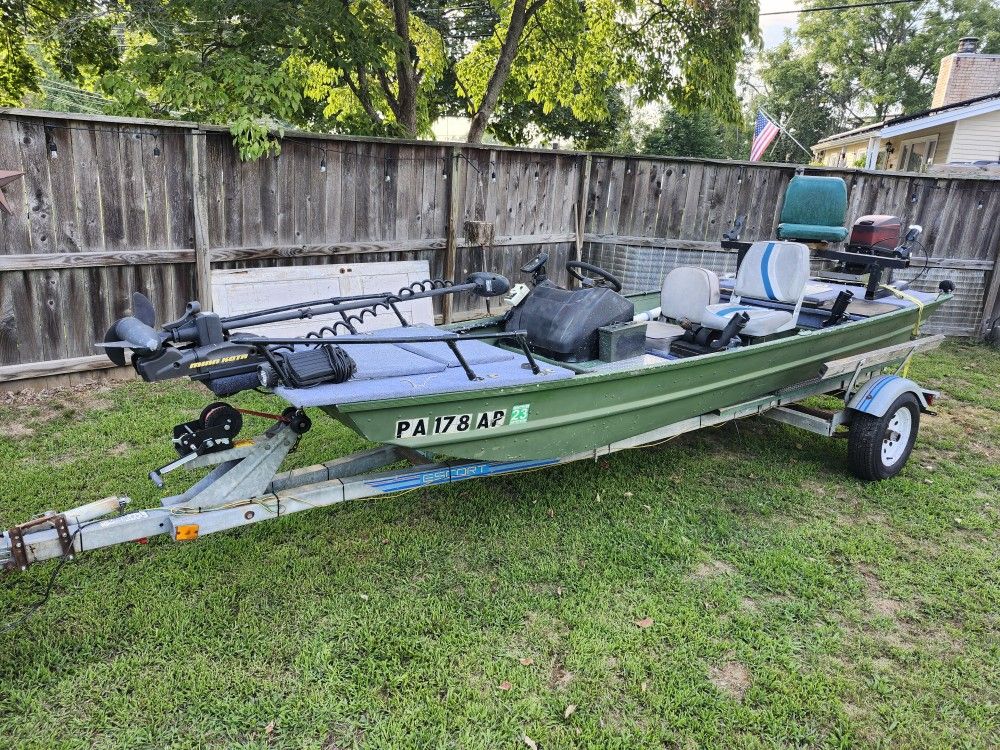 14 Alumacraft Jon Boat/ Mercury Jet 20