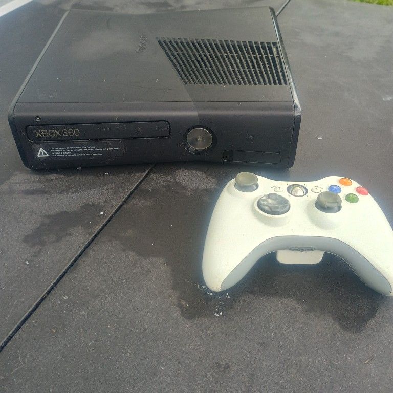 Xbox 360 S Matte Black Model 1439 plus a wireless x box controller 
