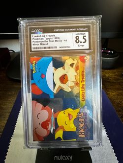 1999 Pokémon Topps First Movie Card (Error: Minor Miscut) #44 CGC 8.5