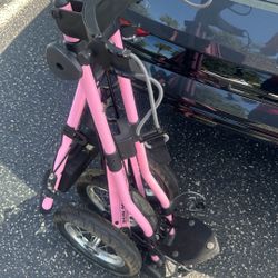 Sun mountain speed cart in pink Push cart 3 wheeler in good working conditions , comes with air pump 