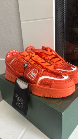 Neon orange bedazzled sneakers