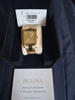 Gold Bulova watch