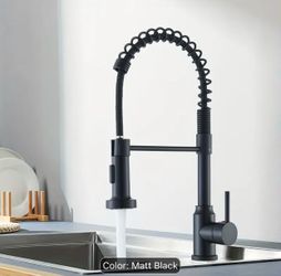 Contemporary Kitchen Faucet Featuring a Single Handle And a High Arch Design, Equipped with a Pull-Down Sprayer in Matte Black And Brushed Nickel End.