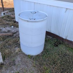 2 55 Gallon Plastic Barrels
