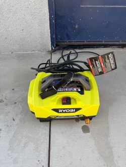 1200 psi Ryobi electric pressure washer includes gun, hose, water tips