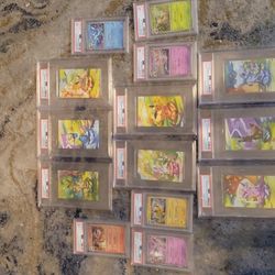 Pokemon Prismatic Eeveelution Cosmos Costco Mini Tin + Tin Arts Graded Set PSA