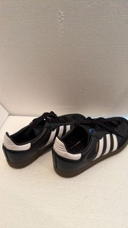 Adidas Samba OG sneakers in the Core Black and Cloud White colorway, $45