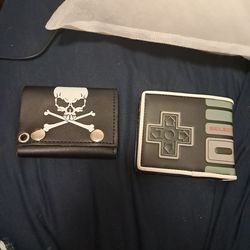 2 wallets nintendo and biker