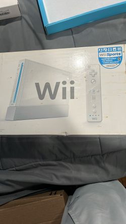 Wii With Games And Remotes 
