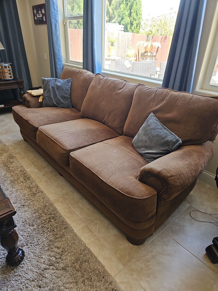 Sofa, Love Seat And Ottoman 