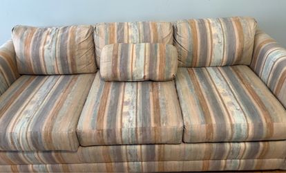 Beige and multicolor sofa couch