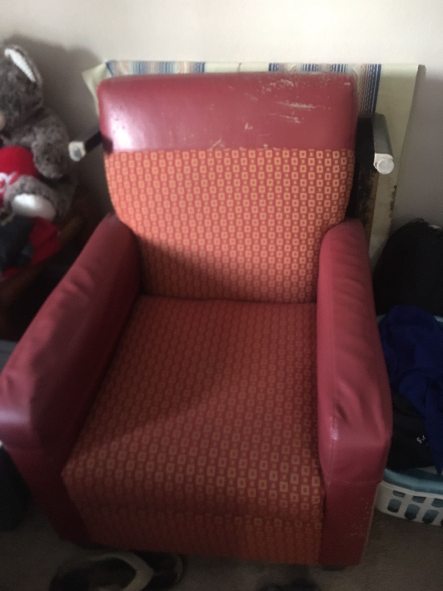 2 red recliner chairs
