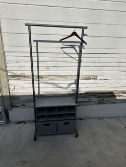 garment rack with storage cubbies 
