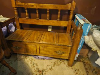 Upcycled bench made from wooden headboard and footboard.