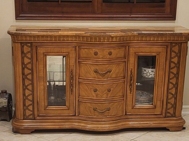 Buffet with wine rack.