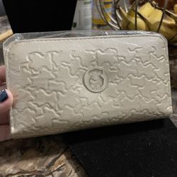 variety of double zipper wallets.  The price is per each