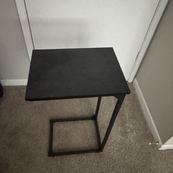C shaped end table for over the sofa.